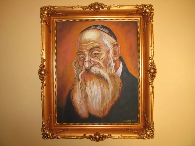 Portret olejny w złoconej ramie zdobionej